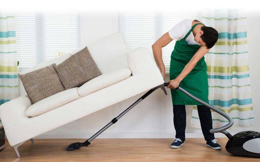 Expert cleaner meticulously cleaning a living room space